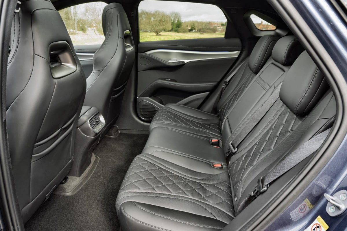 Rear view of BYD Sealion 7 Excellence interior with leather seats for chauffeurs.