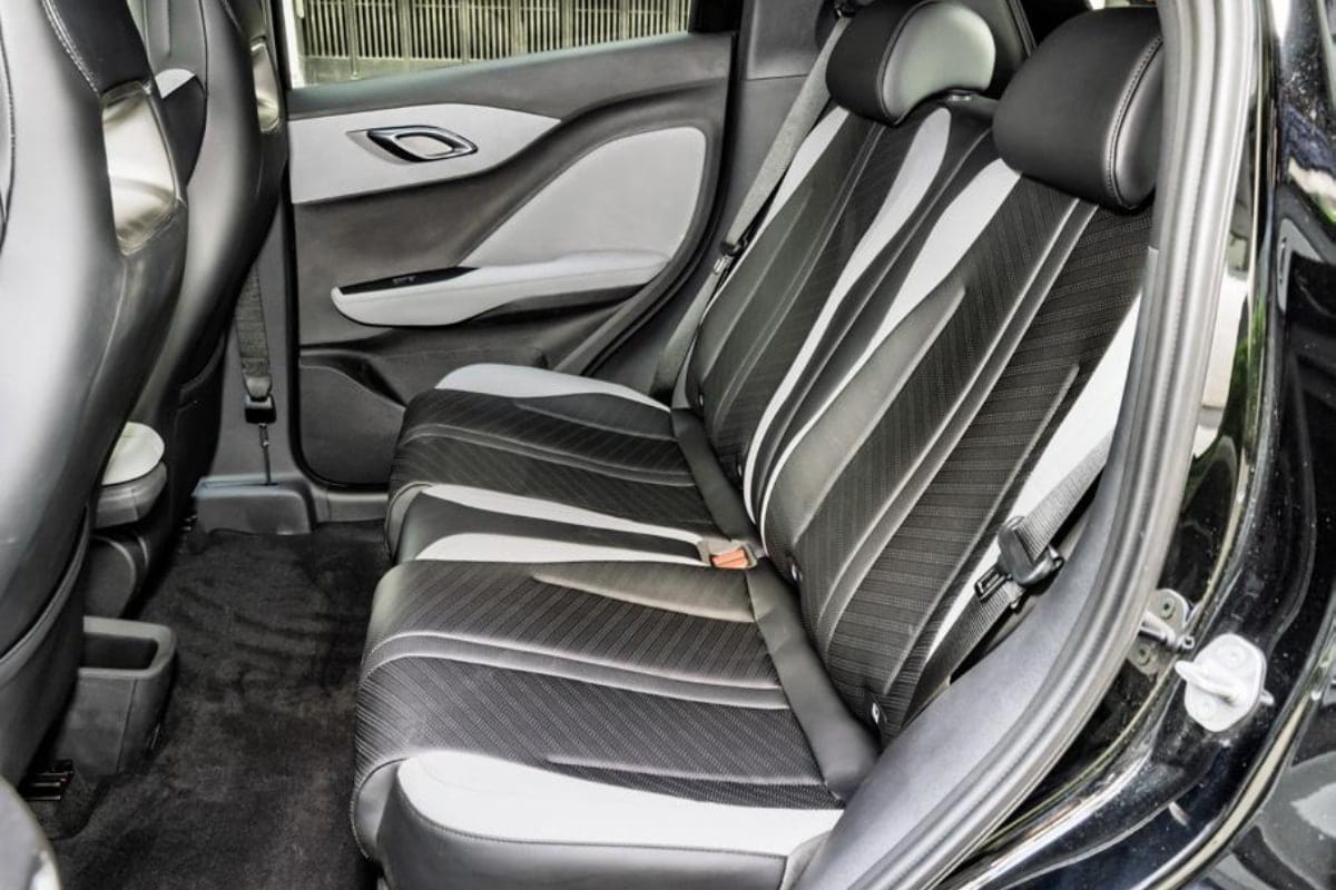 BYD Dolphin rear interior seats, sleek design for comfort, ideal for professional chauffeurs.